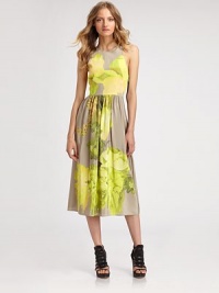 Photo-print florals on woven matte silk, styled with a full skirt and skin-baring crossback.JewelneckSleevelessTop-fit bodiceFull pleated skirtSlash pocketsSide zipperAbout 46 from natural waistSilkDry cleanImportedModel shown is 5'9 (175cm) wearing US size 4. Photo-print florals on woven matte silk, styled with a full skirt and skin-baring crossback.JewelneckSleevelessTop-fit bodiceFull pleated skirtSlash pocketsSide zipperAbout 46 from natural waistSilkDry cleanImportedModel shown is 5'9 (175cm) wearing US size 4.