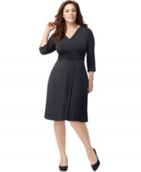 A ruched waist and A-line shape lend a flattering fit to NY Collection's three-quarter sleeve plus size dress, accented by a pleated skirt. A ruched waist and A-line shape lend a flattering fit to NY Collection's three-quarter sleeve plus size dress, accented by a pleated skirt.