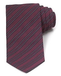 A traditionally striped tie in pure Italian silk lends luxury to your polished wardrobe and can be worn to work or your dressed-up evening affairs. A traditionally striped tie in pure Italian silk lends luxury to your polished wardrobe and can be worn to work or your dressed-up evening affairs.
