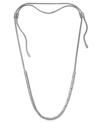 Just the right size. You choose which length best suits your style with Michael Kors adjustable necklace. Wear it long for a trendy look, or short and sassy with a lower-cut shirt. Any way you wear it, this necklace adds a just the right amount of shine with polished slide beads in silver tone mixed metal. Approximate length: up to 37 inches. Just the right size. You choose which length best suits your style with Michael Kors adjustable necklace. Wear it long for a trendy look, or short and sassy with a lower-cut shirt. Any way you wear it, this necklace adds a just the right amount of shine with polished slide beads in silver tone mixed metal. Approximate length: up to 37 inches.