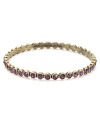 Twinkling amethyst colored stones orbit around this MARC BY MARC JACOBS bangle - making this piece oh-so spot on.