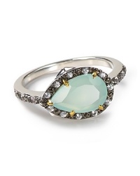 The garden serves as inspiration for this thorn-shaped cocktail ring from Elizabeth and James, accented by striking chalcedony and sapphire stones. The garden serves as inspiration for this thorn-shaped cocktail ring from Elizabeth and James, accented by striking chalcedony and sapphire stones.