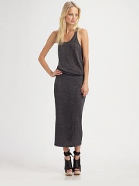Long, sleeveless scoopneck with an elasticized drop waist and sporty racerback. ScoopneckSleevelessPull-on styleElasticized drop waistRacerbackAbout 31 from natural waist96% polyester/4% spandexDry cleanImportedModel shown is 5'9½ (176cm) wearing US size Small. Long, sleeveless scoopneck with an elasticized drop waist and sporty racerback. ScoopneckSleevelessPull-on styleElasticized drop waistRacerbackAbout 31 from natural waist96% polyester/4% spandexDry cleanImportedModel shown is 5'9½ (176cm) wearing US size Small.