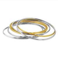 Set of Seven (7) Two Tone Ladies Stainless Steel Bangle Bracelets ( Gold and Silver Tone) Set of Seven (7) Two Tone Ladies Stainless Steel Bangle Bracelets ( Gold and Silver Tone)