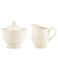 With fanciful beading and a feminine edge, this Lenox French Perle sugar and creamer set is a great addition to your white dinnerware and has an irresistibly old-fashioned sensibility. Hard-wearing stoneware is dishwasher safe and, in a soft white hue with antiqued trim, a graceful addition to any meal. With fanciful beading and a feminine edge, this Lenox French Perle sugar and creamer set is a great addition to your white dinnerware and has an irresistibly old-fashioned sensibility. Hard-wearing stoneware is dishwasher safe and, in a soft white hue with antiqued trim, a graceful addition to any meal.