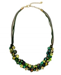 This c.A.K.e. by Ali Khan necklace features multi-colored glass bead clusters (10-12 mm) with a brown suede and gold tone mixed metal setting. Approximate length: 18 inches + 3-inch extender. This c.A.K.e. by Ali Khan necklace features multi-colored glass bead clusters (10-12 mm) with a brown suede and gold tone mixed metal setting. Approximate length: 18 inches + 3-inch extender.