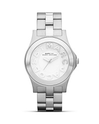 Work a sleek accessory with this stainless steel watch from MARC BY MARC JACOBS. With a striking profile and raised logo markers, it encapsulates understated cool. Work a sleek accessory with this stainless steel watch from MARC BY MARC JACOBS. With a striking profile and raised logo markers, it encapsulates understated cool.