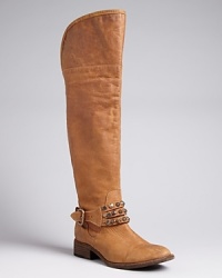 Smokin' hot: These STEVEN BY STEVE MADDEN tall, suede boots are set off to perfection with brilliantly studded ankle harnesses. They're moto-meets-Western and ready to ride. Smokin' hot: These STEVEN BY STEVE MADDEN tall, suede boots are set off to perfection with brilliantly studded ankle harnesses. They're moto-meets-Western and ready to ride.