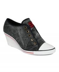 Nine West amps up the style on athletic shoes. With a funky wedge heel, the Bitt 400 sneakers are a girlie take on classic court shoes. Nine West amps up the style on athletic shoes. With a funky wedge heel, the Bitt 400 sneakers are a girlie take on classic court shoes.