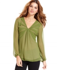 A few gathered pleats and sheer details make this Studio M blouse extra feminine. A few gathered pleats and sheer details make this Studio M blouse extra feminine.