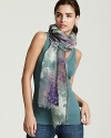 Add a soft, graceful touch to your next ensemble in a floral watercolor-like wrap from Villa Cerese.