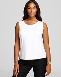 No wardrobe arsenal is complete without a slouchy white tank. Pair this Karen Kane staple with jeans for classic Americana style. No wardrobe arsenal is complete without a slouchy white tank. Pair this Karen Kane staple with jeans for classic Americana style.