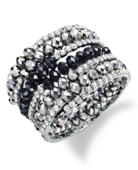 Wrap your wrists with edgy glam. INC International Concepts' coil bracelet features a mix of glass stones and rondelles with a cupchain. Crafted in imitation rhodium-plated mixed metal. Approximate diameter: 2 inches. Wrap your wrists with edgy glam. INC International Concepts' coil bracelet features a mix of glass stones and rondelles with a cupchain. Crafted in imitation rhodium-plated mixed metal. Approximate diameter: 2 inches.