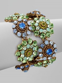 A truly sparkling piece with radial designed links, comprised of Swarvoski crystals and rhinestones in beautifully tonal colors. Swarvoski crystalsGlass stonesBrass and pewterLength, about 7½Fold-over clasp closureMade in USA A truly sparkling piece with radial designed links, comprised of Swarvoski crystals and rhinestones in beautifully tonal colors. Swarvoski crystalsGlass stonesBrass and pewterLength, about 7½Fold-over clasp closureMade in USA