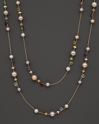 From the Paradise collection, a gold necklace with semi-precious stones and freshwater pearls, designed by Marco Bicego. Shown doubled, but can be worn as one long strand. From the Paradise collection, a gold necklace with semi-precious stones and freshwater pearls, designed by Marco Bicego. Shown doubled, but can be worn as one long strand.