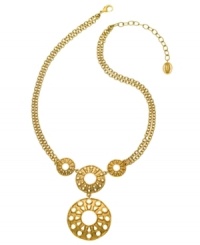 Glam it up like a golden goddess. T Tahari's sunshine-inspired pendant features a double circle drop in antique gold tone mixed metal. Base metal is nickel-free for sensitive skin. Approximate length: 18 inches + 3-inch extender. Approximate drop: 3-1/2 inches.