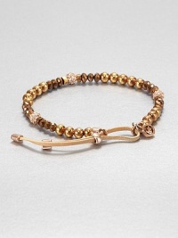 From the Brilliance Collection. A mix of beads in warm shades of rose gold and bronze includes faceted glass, smooth rose gold-finished stainless steel and rhinestone-crusted spheres, strung on a stretchy strand with a leather slide close.GlassRose goldtone and stainless steelLeatherDiameter, about 2.25Imported From the Brilliance Collection. A mix of beads in warm shades of rose gold and bronze includes faceted glass, smooth rose gold-finished stainless steel and rhinestone-crusted spheres, strung on a stretchy strand with a leather slide close.GlassRose goldtone and stainless steelLeatherDiameter, about 2.25Imported