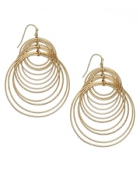 Spiral style. INC International Concepts comes full circle with this pair of hook earrings. Crafted from gold-tone mixed metal, the earrings offer a post-modern fashion touch. Approximate drop: 2-1/2 inches. Spiral style. INC International Concepts comes full circle with this pair of hook earrings. Crafted from gold-tone mixed metal, the earrings offer a post-modern fashion touch. Approximate drop: 2-1/2 inches.