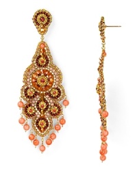 An ornate cascade formed from beautiful 14-karat gold, Swarovski crystals, and coral beads, Miguel Ases' chandelier earrings are a captivating jewelry choice. An ornate cascade formed from beautiful 14-karat gold, Swarovski crystals, and coral beads, Miguel Ases' chandelier earrings are a captivating jewelry choice.