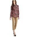 THE LOOKAllover abstract rose printPeter Pan collarButton closureChest pocketLong sleeves with vent in cuffs and button closureTHE FITAbout 28 from shoulder to hemTHE MATERIALCottonCARE & ORIGINDry cleanImportedModel shown is 5'11 (180cm) wearing US size 4. 