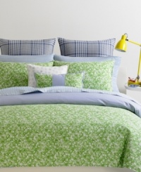 Country chic. Featuring an allover green floral design, this Tommy Hilfiger Hydrangea Petals duvet cover set evokes a traditional feel with a countryside twist. Duvet cover reverses to a blue and white mini-gingham pattern. Button closure. Country chic. Featuring an allover green floral design, this Tommy Hilfiger Hydrangea Petals duvet cover set evokes a traditional feel with a countryside twist. Duvet cover reverses to a blue and white mini-gingham pattern. Button closure.