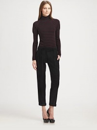 Pleats add a relaxed look to this woven wool silhouette. Self waistband with belt loopsZip flyFront pleatsSide slash pocketsBack welt pocketsInseam, about 32WoolDry cleanImported of Italian fabricModel shown is 5'11 (180cm) wearing US size 4. Pleats add a relaxed look to this woven wool silhouette. Self waistband with belt loopsZip flyFront pleatsSide slash pocketsBack welt pocketsInseam, about 32WoolDry cleanImported of Italian fabricModel shown is 5'11 (180cm) wearing US size 4.