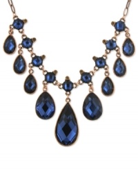 2028 is feeling blue, but in a good way. This bib necklace is crafted from copper-tone mixed metal and adorned with stunning blue stone teardrop accents. Approximate adjustable length: 16 inches + 3-inch extender. Approximate drop: 2-1/2 inches.