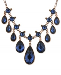 2028 is feeling blue, but in a good way. This bib necklace is crafted from copper-tone mixed metal and adorned with stunning blue stone teardrop accents. Approximate adjustable length: 16 inches + 3-inch extender. Approximate drop: 2-1/2 inches. 2028 is feeling blue, but in a good way. This bib necklace is crafted from copper-tone mixed metal and adorned with stunning blue stone teardrop accents. Approximate adjustable length: 16 inches + 3-inch extender. Approximate drop: 2-1/2 inches.