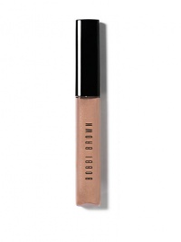 Bobbi has sized up all her glosses to give you an extra dose of shine. Shimmer Lip Gloss offers beautiful, non-sticky shine with a touch of iridescence and is perfect on its own or over your favorite lipstick. Formulated with Aloe Extract to soothe and soften lips; Vitamins C and E for anti-oxidant protection; and Jojoba and Avocado Oils to moisturize lips. 0.24 oz. Bobbi has sized up all her glosses to give you an extra dose of shine. Shimmer Lip Gloss offers beautiful, non-sticky shine with a touch of iridescence and is perfect on its own or over your favorite lipstick. Formulated with Aloe Extract to soothe and soften lips; Vitamins C and E for anti-oxidant protection; and Jojoba and Avocado Oils to moisturize lips. 0.24 oz.
