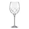 This kate spade new york Annadale iced beverage glass is rendered in sparkling European crystal cut with a swirled design.