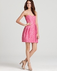 Packed with feminine details, this Shoshanna strapless dress makes a charming statement at every twirl. Packed with feminine details, this Shoshanna strapless dress makes a charming statement at every twirl.