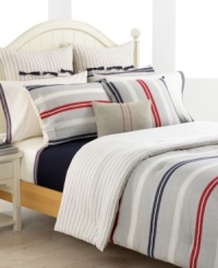 Show your stripes! Featuring a yarn-dyed herringbone and twill weave in stripes of navy, red and ivory, the Tommy Hilfiger Newport Bay duvet cover set renews your bed in classic American style. Reverses to navy pinstripe print. Sham features side button closure.