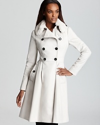 A perennial wardrobe staple, this Burberry London trench boasts a plush fur collar and feminine skirted silhouette for classic chic. A perennial wardrobe staple, this Burberry London trench boasts a plush fur collar and feminine skirted silhouette for classic chic.