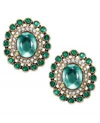 Timeless beauty from Bar III. Emerald-colored crystals are gently placed on an oval silhouette on these lovely earrings. Crafted in gold tone mixed metal. Approximate diameter: 1 inch. Timeless beauty from Bar III. Emerald-colored crystals are gently placed on an oval silhouette on these lovely earrings. Crafted in gold tone mixed metal. Approximate diameter: 1 inch.