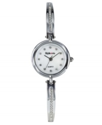 A lovely bangle bracelet lined with crystals. This Style&co watch features a silvertone alloy bracelet with crystal accents and a round alloy case. Mother of pearl dial with crystals at indices and logo. Quartz movement. Two-year limited warranty. A lovely bangle bracelet lined with crystals. This Style&co watch features a silvertone alloy bracelet with crystal accents and a round alloy case. Mother of pearl dial with crystals at indices and logo. Quartz movement. Two-year limited warranty.