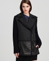 Layer on the luxe with this Edun coat flaunting an asymmetric zip and leather panels for a dose of downtown cool.