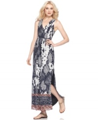 A pixelated python print and a contrast hem adds a graphic edge to this MM Couture maxi dress while a back keyhole & side slits turn up the heat for spring! A pixelated python print and a contrast hem adds a graphic edge to this MM Couture maxi dress while a back keyhole & side slits turn up the heat for spring!