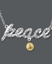 Sweet, sparkling and symbolic. This pretty peace pendant is encrusted with round-cut diamonds (1/6 ct. t.w.) and features a 14k gold peace sign charm. Crafted in sterling silver. Approximate length: 18 inches. Approximate drop: 1-1/4 inches.