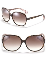 Go glam in round oversized tortoise sunglasses from MARC BY MARC JACOBS. Go glam in round oversized tortoise sunglasses from MARC BY MARC JACOBS.