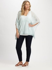 Featuring a flattering, classic Empire waist and striking embroidery, this is the style you've been waiting for.V-necklineEmpire waistEmbroidered trimAbout 32 from shoulder to hemRayonMachine washImported Featuring a flattering, classic Empire waist and striking embroidery, this is the style you've been waiting for.V-necklineEmpire waistEmbroidered trimAbout 32 from shoulder to hemRayonMachine washImported
