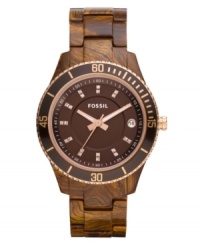 A gorgeous combo of faux-burlwood and rosy hues lift this Stella watch by Fossil to stylish new heights. A gorgeous combo of faux-burlwood and rosy hues lift this Stella watch by Fossil to stylish new heights.