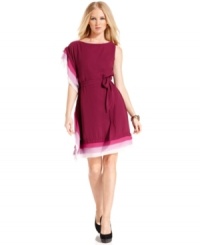 Vince Camuto highlights this dress with vibrantly colored, tiered detail at the side and hem. (Clearance) Vince Camuto highlights this dress with vibrantly colored, tiered detail at the side and hem. (Clearance)