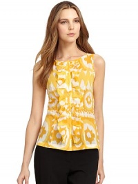THE LOOKRound necklineSleevelessFront button closure with ruffle placketTHE FITAbout 25 from shoulder to hemTHE MATERIALCottonCARE & ORIGINDry cleanImportedModel shown is 5'10½ (179cm) wearing US size 4. THE LOOKRound necklineSleevelessFront button closure with ruffle placketTHE FITAbout 25 from shoulder to hemTHE MATERIALCottonCARE & ORIGINDry cleanImportedModel shown is 5'10½ (179cm) wearing US size 4.