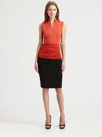 This crisp cotton style features a sculptural stand collar and a soft, cummerbund-inspired bottom panel.Stand collarSurplice necklineSleevelessCummerbund-inspired panelCotton/polyamide/elastaneDry cleanImported of Swiss fabricModel shown is 5'10 (177cm) wearing US size 4. This crisp cotton style features a sculptural stand collar and a soft, cummerbund-inspired bottom panel.Stand collarSurplice necklineSleevelessCummerbund-inspired panelCotton/polyamide/elastaneDry cleanImported of Swiss fabricModel shown is 5'10 (177cm) wearing US size 4.
