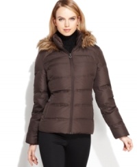 Calvin Klein's puffer features classic styling and a fitted, feminine touch. A zip-off hood trimmed in faux fur adds the finishing touch. Calvin Klein's puffer features classic styling and a fitted, feminine touch. A zip-off hood trimmed in faux fur adds the finishing touch.