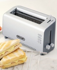 Lunch and dinner options are endless! De'Longhi presents a sleek brushed aluminum toaster designed with a long, adjustable slot, perfect for toasting everything from bagels to ciabatta bread. The unique sandwich cage allows for toasty sandwiches with warm, crispy results. One-year warranty. Model DTT312. Lunch and dinner options are endless! De'Longhi presents a sleek brushed aluminum toaster designed with a long, adjustable slot, perfect for toasting everything from bagels to ciabatta bread. The unique sandwich cage allows for toasty sandwiches with warm, crispy results. One-year warranty. Model DTT312.