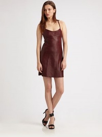 Perfectly cut, rich leather in a short silhouette with a plunging scoopneck, self tie and spaghetti straps that intertwine at the back. Plunging scoopneckSpaghetti straps criss-cross at backSelf tie at backAbout 18 from natural waistLeatherDry clean with leather specialistImported of Italian fabricModel shown is 5'11 (180cm) wearing US size Small. Perfectly cut, rich leather in a short silhouette with a plunging scoopneck, self tie and spaghetti straps that intertwine at the back. Plunging scoopneckSpaghetti straps criss-cross at backSelf tie at backAbout 18 from natural waistLeatherDry clean with leather specialistImported of Italian fabricModel shown is 5'11 (180cm) wearing US size Small.