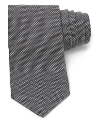 Carefully woven for a handsome check design, this premier tie from Armani Collezioni is made from lavish Italian silk for a luxurious addition to your wardrobe. Carefully woven for a handsome check design, this premier tie from Armani Collezioni is made from lavish Italian silk for a luxurious addition to your wardrobe.