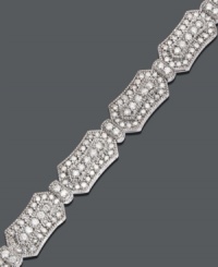 Unique design combines with extraordinary elegance. This beautifully-crafted bracelet features an intricate dot design covered in sparkling round-cut diamond (3 ct. t.w.) set in 14k white gold. Approximate length: 7-1/2 inches. Unique design combines with extraordinary elegance. This beautifully-crafted bracelet features an intricate dot design covered in sparkling round-cut diamond (3 ct. t.w.) set in 14k white gold. Approximate length: 7-1/2 inches.