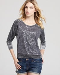 Sport some shimmer in a sequin-embellished Aqua sweatshirt and work laid-back luxe in its truest form. Sport some shimmer in a sequin-embellished Aqua sweatshirt and work laid-back luxe in its truest form.